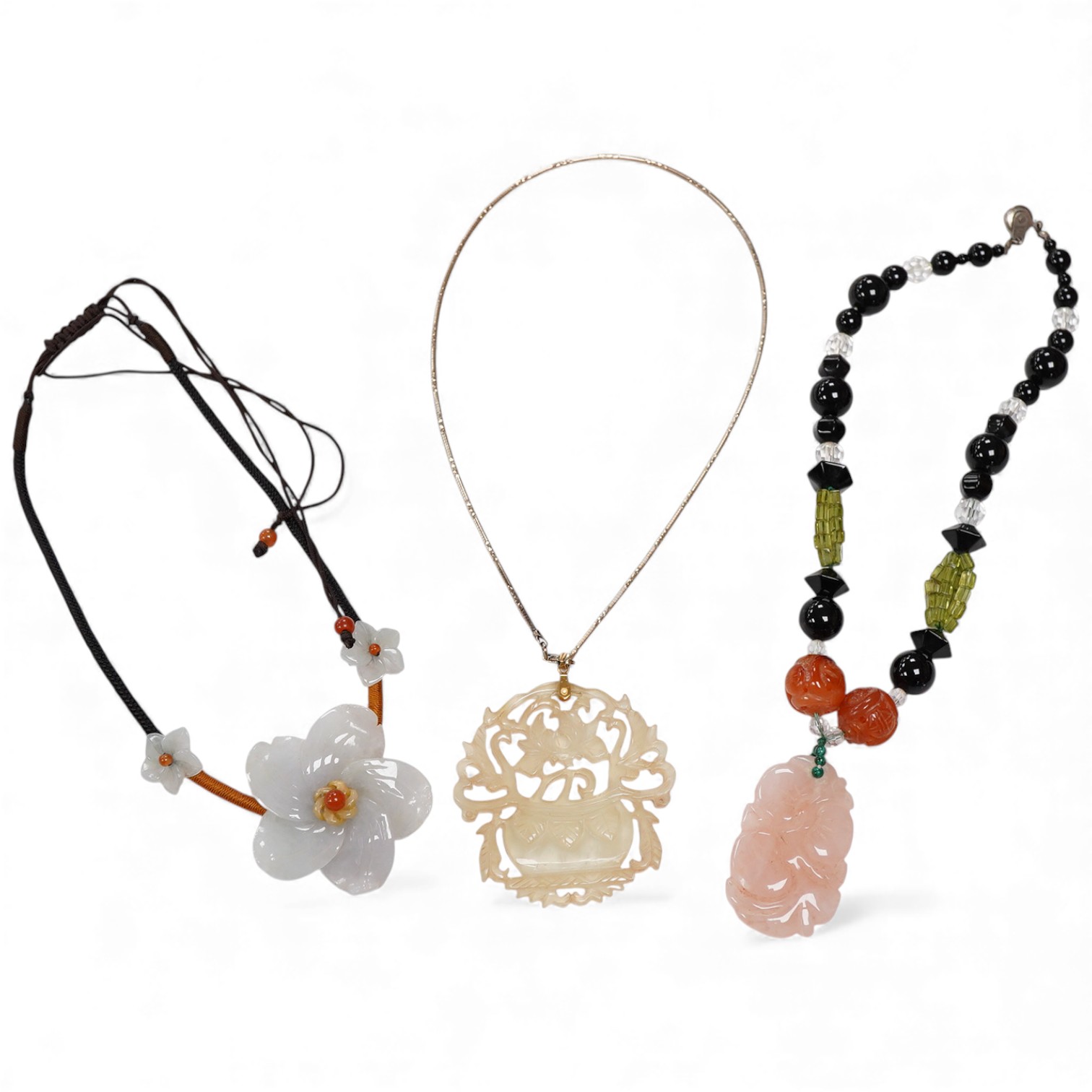A Chinese jadeite flowerhead necklace, a hardstone mounted necklace and a bowenite jade pendant and 925 chain